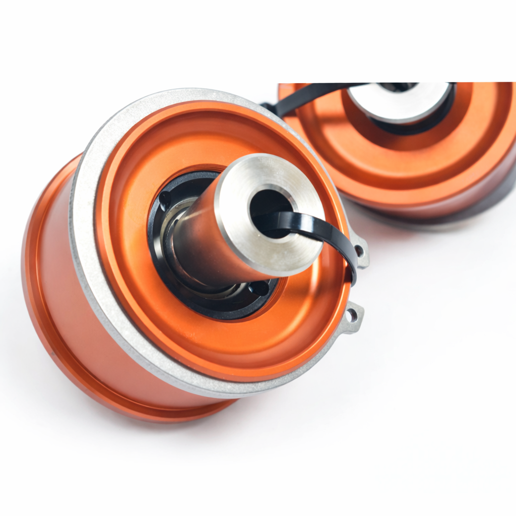 Close-up of spherical uniball bearing and anodized housing