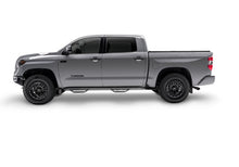 Load image into Gallery viewer, Silver crew cab pickup with N-Fab nerf steps installed, side profile view