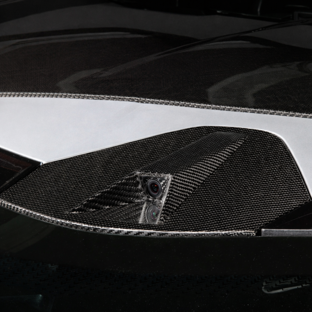 Carbon fiber camera bezel installed on Corvette C8 rear