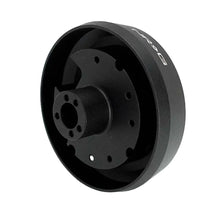 Load image into Gallery viewer, Rear three quarter view of the NRG SRK-145H short hub adapter showing the hollow body and splined shaft bore