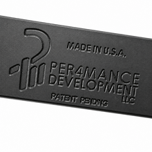Load image into Gallery viewer, Per4mance Development BRB Billet Race Brace logo detail