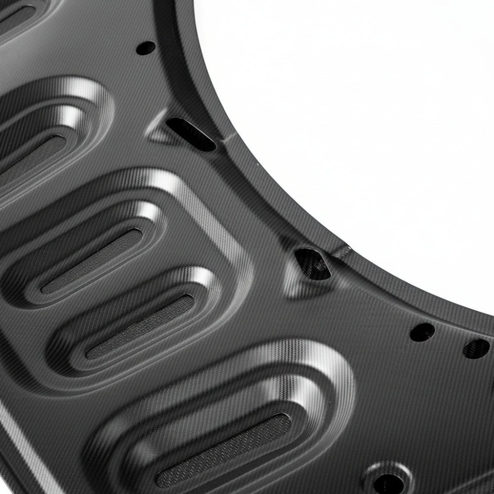 Close-up of the Porsche 992 GT3 carbon fiber hood underside rib structure and matte inner surface