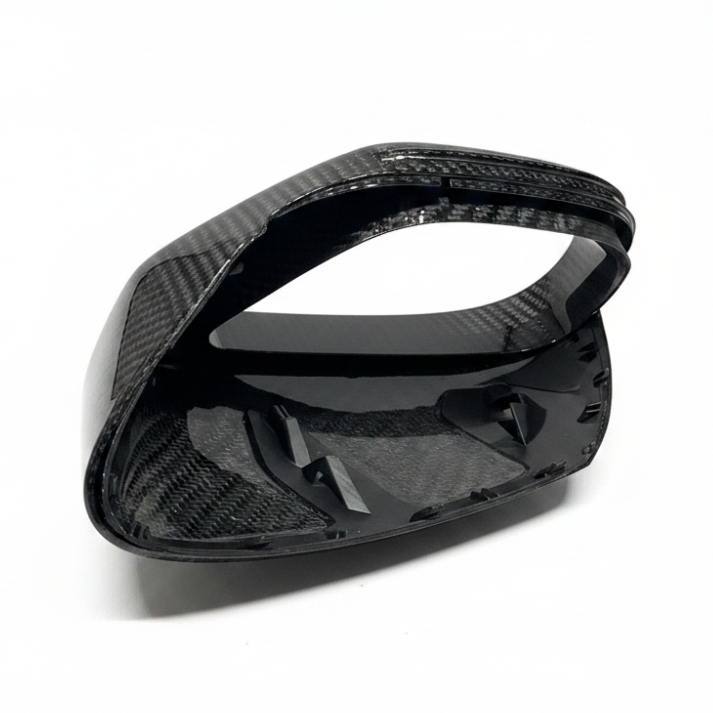 Porsche Taycan carbon fiber mirror housing, underside clip and mounting detail
