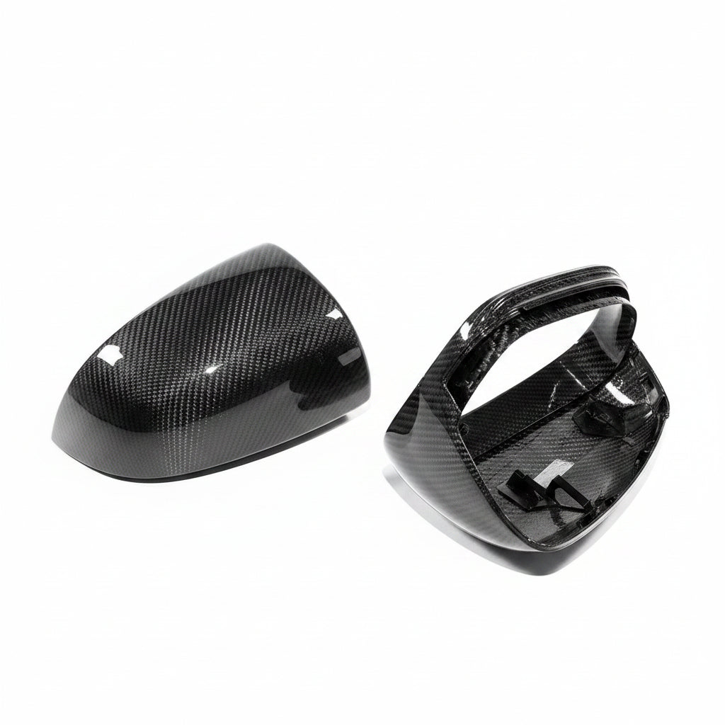 Porsche Taycan carbon fiber mirror housing pair, underside mounting clip view