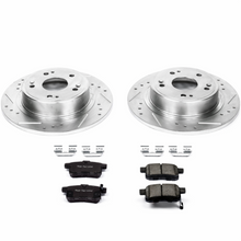 Load image into Gallery viewer, Close-up of drilled &amp; slotted zinc plated rotor