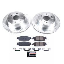 Load image into Gallery viewer, PowerStop K6562 drilled and slotted rotors and brake pads on a white background