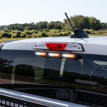 Load image into Gallery viewer, Rear view of Ford F-150 with Putco Stinger third brake light upgrade