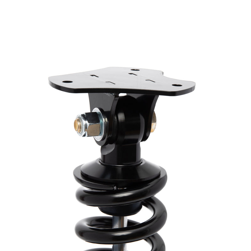 QA1 front coilover installed on 2021+ F-150 4WD showing drop