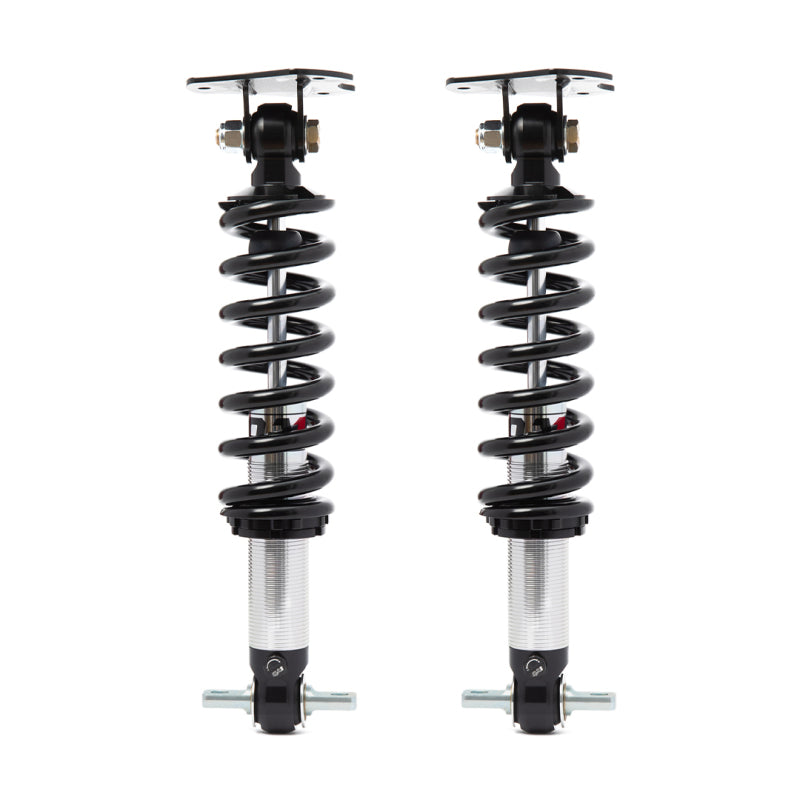 Photo of QA1 dual adjustable coilover pair outside of package for 2021-2025 Ford F150 4WD lowering kit