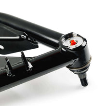 Load image into Gallery viewer, Close-up of QA1 control arm ball joint with orange cap and stud for 99-06 Chevy Silverado 1500 2WD front suspension kit.