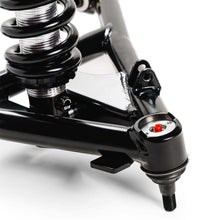Load image into Gallery viewer, Close-up side view of QA1 99-06 Chevy Silverado 1500 2WD single adjustable front suspension assembly showing coilover spring, control arm, and shock mount