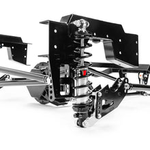 Load image into Gallery viewer, Close-up of QA1 rear suspension brackets and mounting hardware for 99–06 Silverado 1500