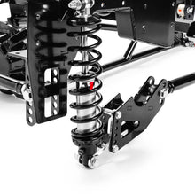 Load image into Gallery viewer, Angled view of QA1 single adjustable coil-over shock with mounting bracket and crossmember in the rear suspension kit for 1999-2006 Chevy Silverado 1500 short bed