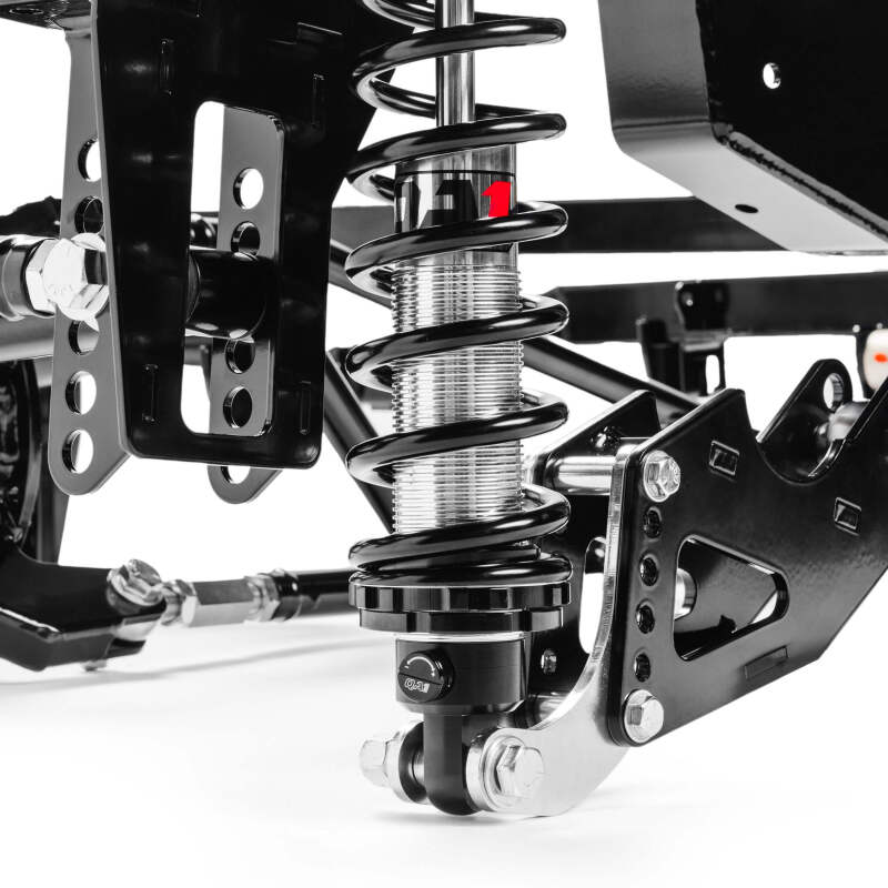 View of QA1 torque arm, trailing arms and adjustable panhard bar assembled in rear suspension kit for 1999-2006 Chevy Silverado 1500 short bed