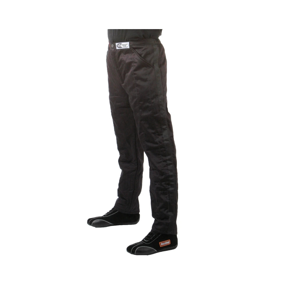 RaceQuip 120 Series black racing pants worn side view