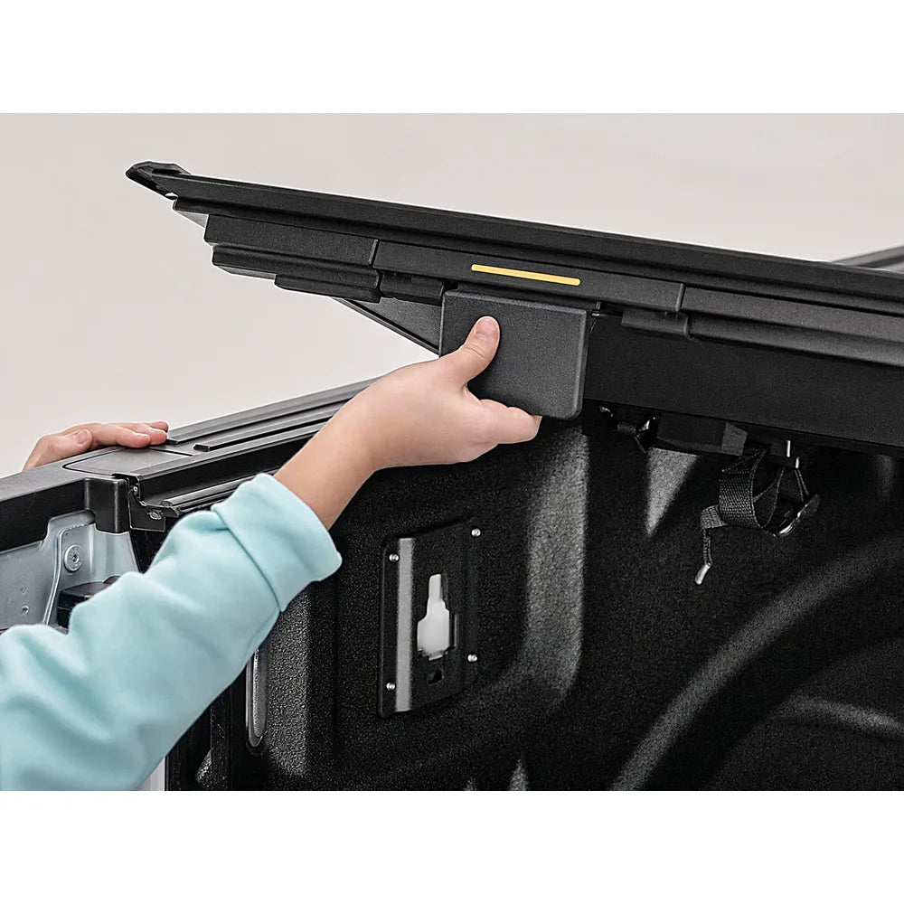 BAKFlip MX4 tonneau cover folded open for full bed access on a Ram 1500