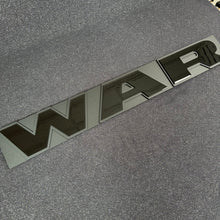 Load image into Gallery viewer, Ram 1500 TRX OEM Color Matched WAR Grille Badge