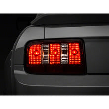 Load image into Gallery viewer, Raxiom 05-09 Ford Mustang Coyote Tail Lights- Black Housing (Smoked Lens) - Raxiom 49117