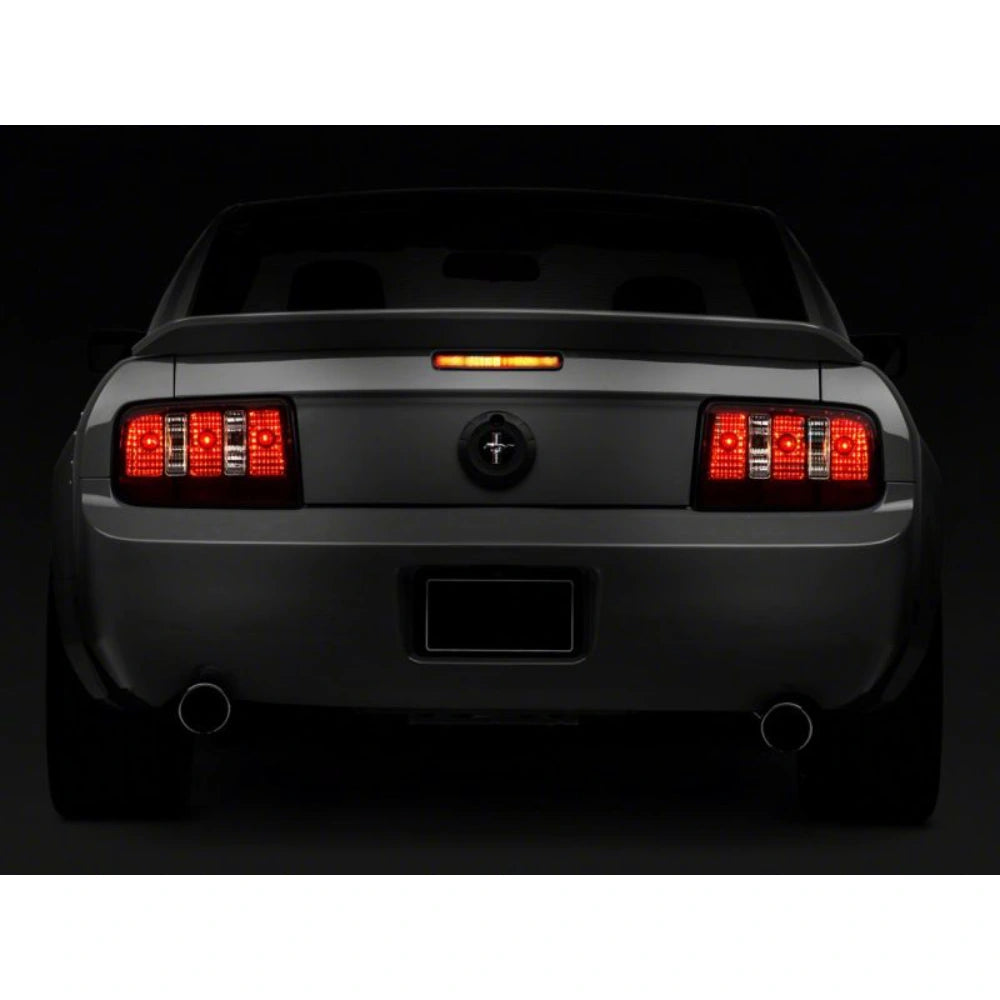 Raxiom 05-09 Ford Mustang Coyote Tail Lights- Black Housing (Smoked Lens) - Raxiom 49117