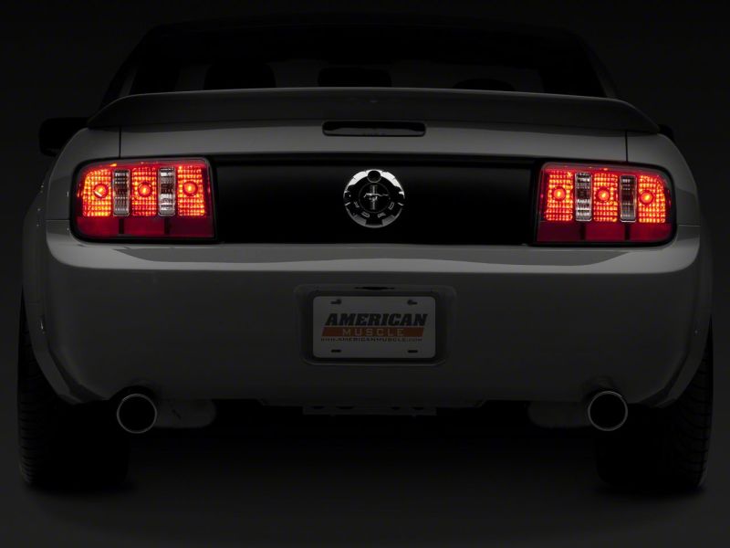 Raxiom Raxiom 05-09 Ford Mustang Coyote Tail Lights- Chrome Housing - Red/Clear Lens