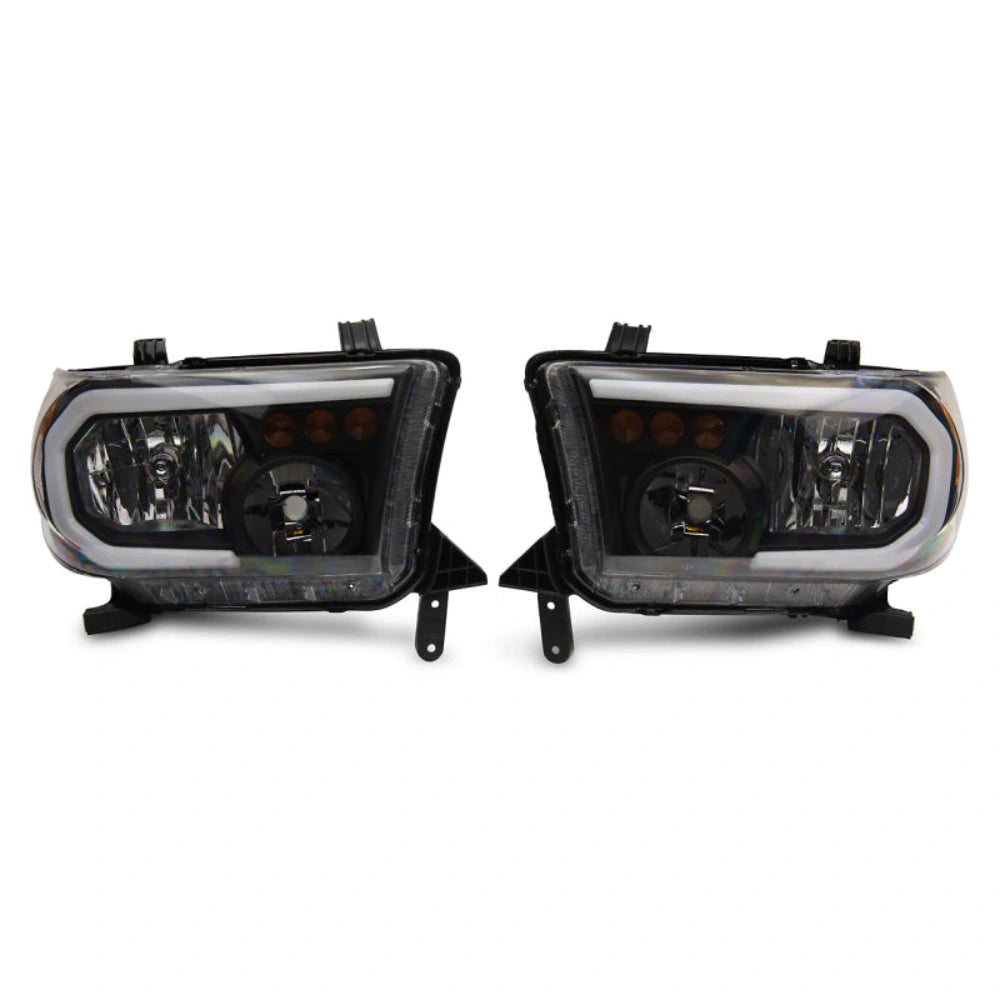 Raxiom 07-13 Toyota Tundra Axial Series Headlights w/ LED Bar- Black Housing (Clear Lens) - Raxiom TU16004