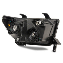 Load image into Gallery viewer, Raxiom 07-13 Toyota Tundra Axial Series Headlights w/ LED Bar- Black Housing (Clear Lens) - Raxiom TU16004