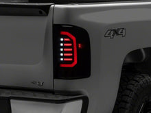 Load image into Gallery viewer, Raxiom Raxiom 07-14 Chevrolet Silverado 1500 Axial Series LED Tail Lights- Black Housing (Smoked Lens)