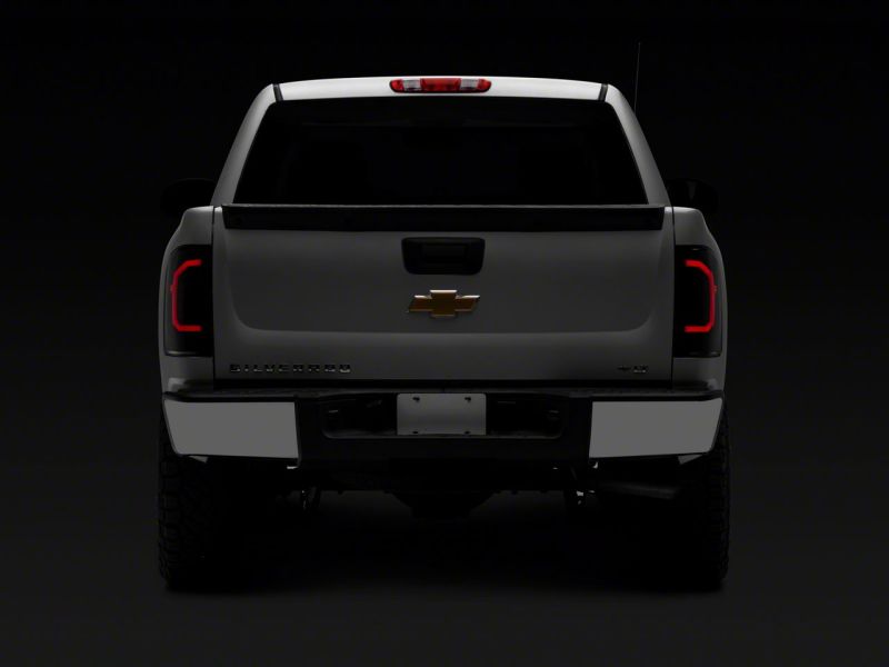 Raxiom Raxiom 07-14 Chevrolet Silverado 1500 Axial Series LED Tail Lights- Black Housing (Smoked Lens)