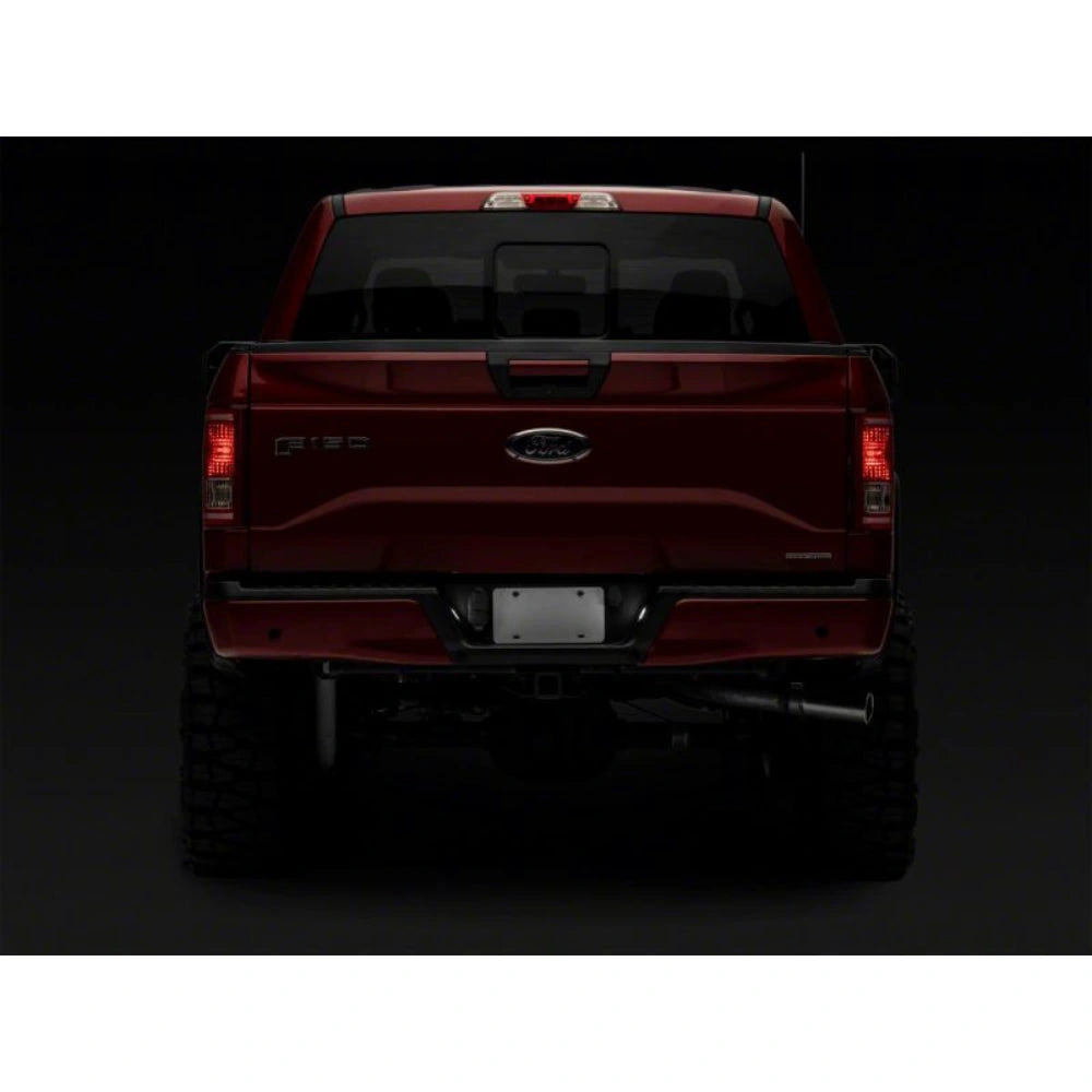 Raxiom 07-14 Ford F-150 Axial Series LED License Plate Lamps- Smoked - Raxiom T549999