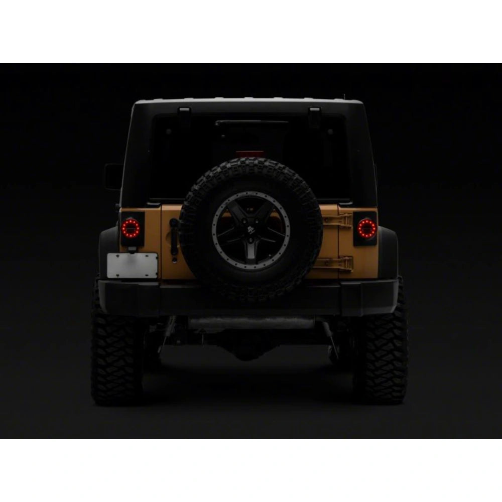 Raxiom 07-18 Jeep Wrangler JK Axial Series Halo LED Tail Lights- Black Housing (Clear Lens) - Raxiom J164240