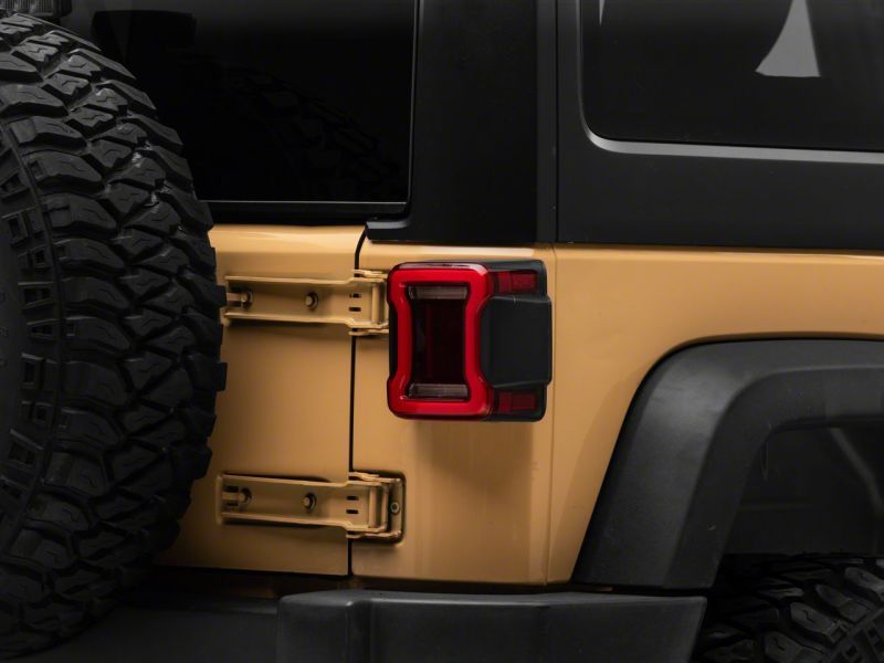 Raxiom Raxiom 07-18 Jeep Wrangler JK Axial Series JL Style LED Tail Lights- Black Housing- Red Lens