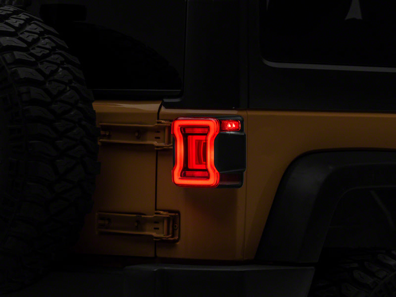 Raxiom Raxiom 07-18 Jeep Wrangler JK Axial Series JL Style LED Tail Lights- Black Housing- Red Lens
