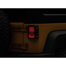 Load image into Gallery viewer, Raxiom 07-18 Jeep Wrangler JK Axial Series Lux LED Tail Lights- Black Housing (Clear Lens) - Raxiom J141596