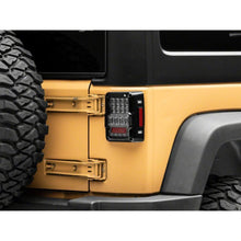 Load image into Gallery viewer, Raxiom 07-18 Jeep Wrangler JK Axial Series Lux LED Tail Lights- Black Housing (Clear Lens) - Raxiom J141596