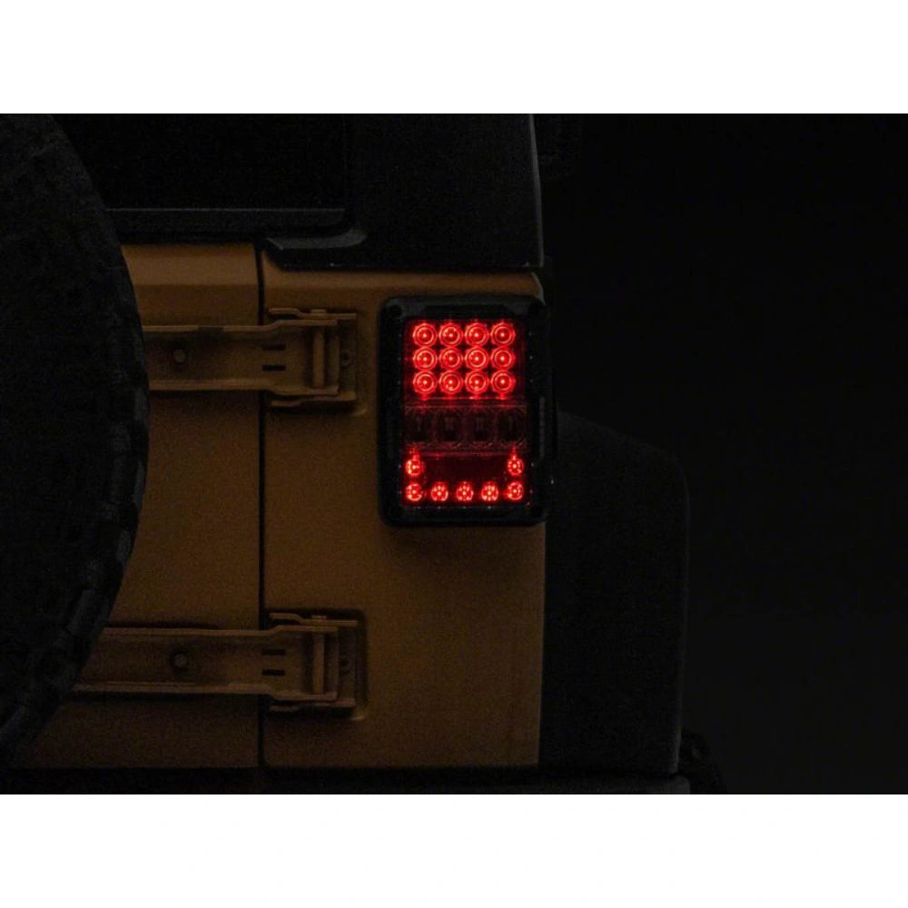 Raxiom 07-18 Jeep Wrangler JK Axial Series Lux LED Tail Lights- Black Housing (Clear Lens) - Raxiom J141596