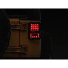 Load image into Gallery viewer, Raxiom 07-18 Jeep Wrangler JK Axial Series Lux LED Tail Lights- Black Housing (Clear Lens) - Raxiom J141596