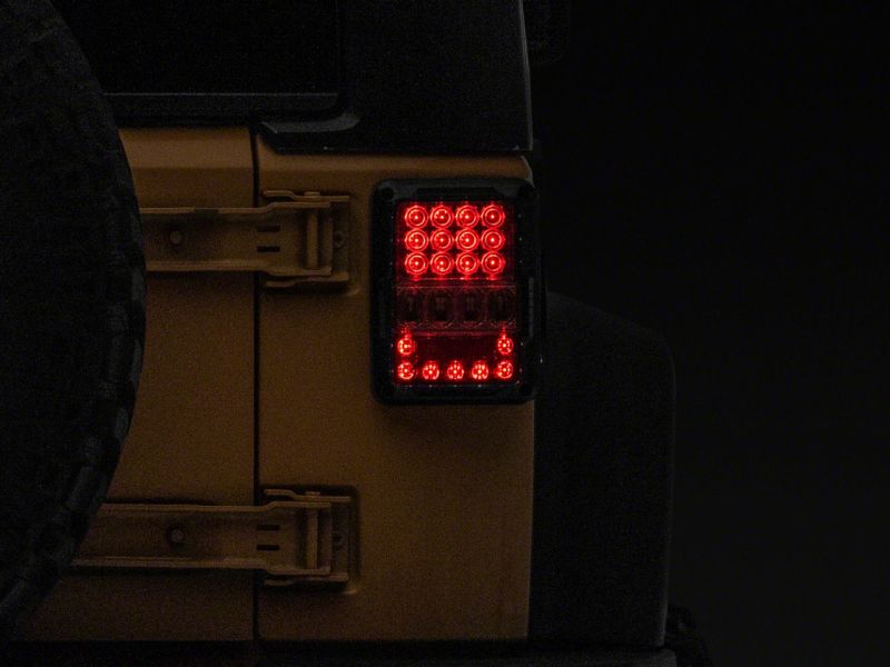 Raxiom Raxiom 07-18 Jeep Wrangler JK Axial Series Lux LED Tail Lights- Black Housing (Clear Lens)