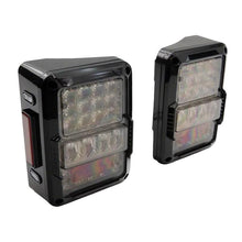 Load image into Gallery viewer, Raxiom Raxiom 07-18 Jeep Wrangler JK Axial Series Lux LED Tail Lights- Black Housing (Clear Lens)