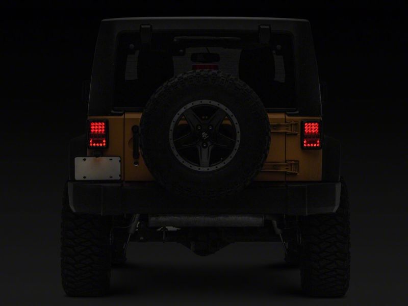 Raxiom Raxiom 07-18 Jeep Wrangler JK Axial Series Lux LED Tail Lights- Black Housing (Clear Lens)