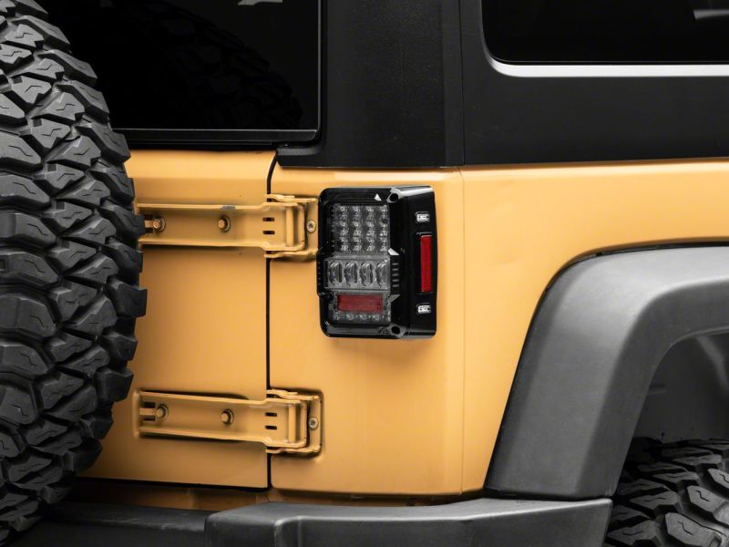 Raxiom Raxiom 07-18 Jeep Wrangler JK Axial Series Lux LED Tail Lights- Black Housing (Clear Lens)