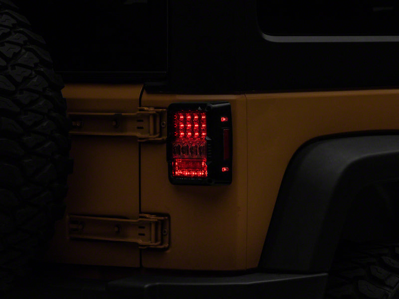 Raxiom Raxiom 07-18 Jeep Wrangler JK Axial Series Lux LED Tail Lights- Black Housing (Clear Lens)