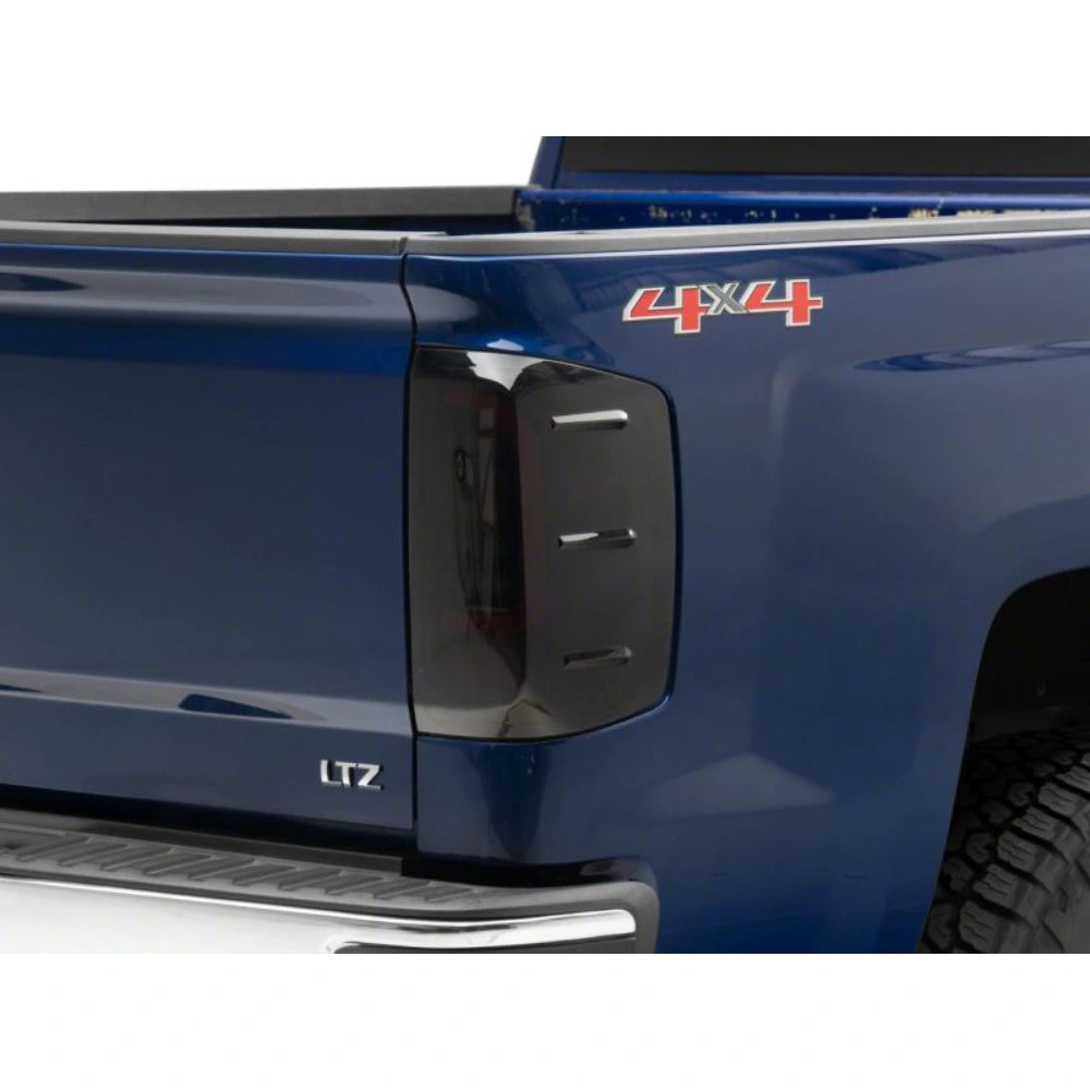 Raxiom 14-18 Chevrolet Silverado 1500 Axial Series LED Tail Lights- Black Housing (Smoked Lens) - Raxiom S151298