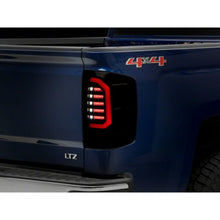Load image into Gallery viewer, Raxiom 14-18 Chevrolet Silverado 1500 Axial Series LED Tail Lights- Black Housing (Smoked Lens) - Raxiom S151298