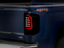Load image into Gallery viewer, Raxiom Raxiom 14-18 Chevrolet Silverado 1500 Axial Series LED Tail Lights- Black Housing (Smoked Lens)