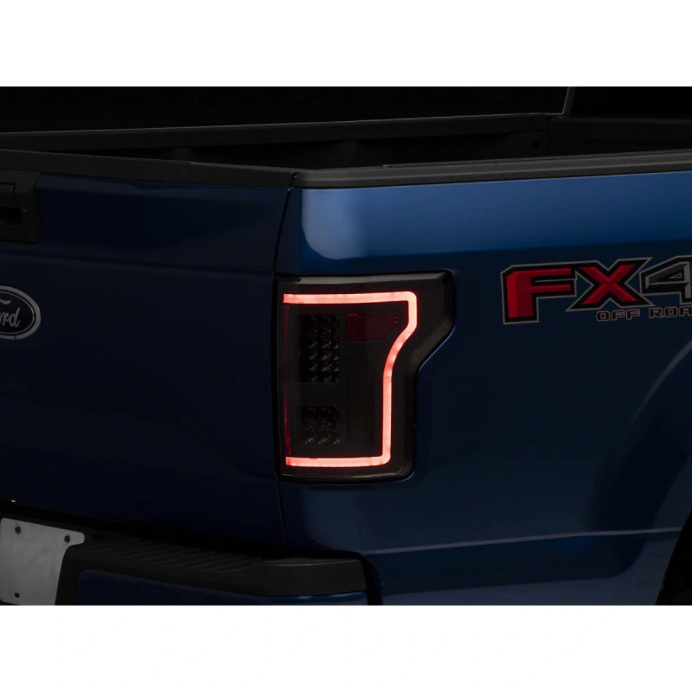Raxiom 15-17 Ford F-150 LED Tail Lights w/ SEQL Turn Signals- Black Housing (Clear Lens) - Raxiom T544625