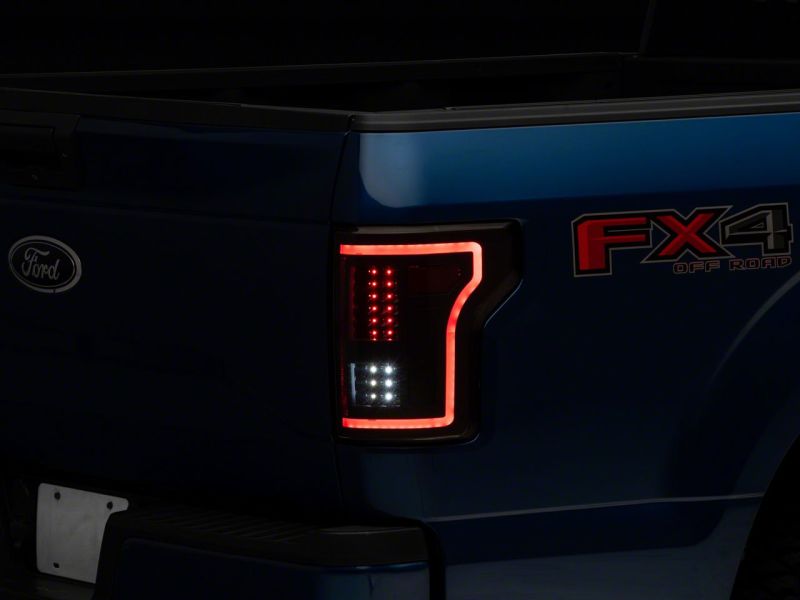 Raxiom Raxiom 15-17 Ford F-150 LED Tail Lights w/ SEQL Turn Signals- Black Housing (Clear Lens)