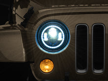 Load image into Gallery viewer, Raxiom Raxiom 97-18 Jeep Wrangler TJ/JK Axial 7-Inch LED Headlights w/RGB Halo- Black Housing (Clear Lens)
