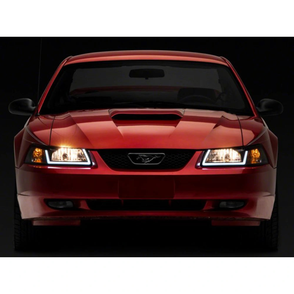 Raxiom 99-04 Ford Mustang Axial Series Headlights w/ LED Bar- Black Housing (Clear Lens) - Raxiom 422712
