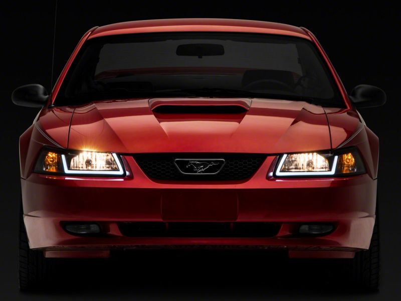 Raxiom Raxiom 99-04 Ford Mustang Axial Series Headlights w/ LED Bar- Black Housing (Clear Lens)