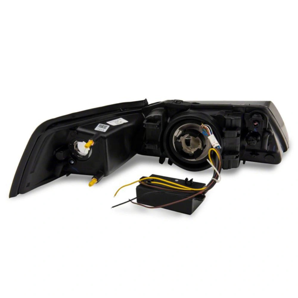 Raxiom 99-04 Ford Mustang Axial Series Headlights w/ Sequential LED Bar- Black Housing (Clear Lens) - Raxiom 422713